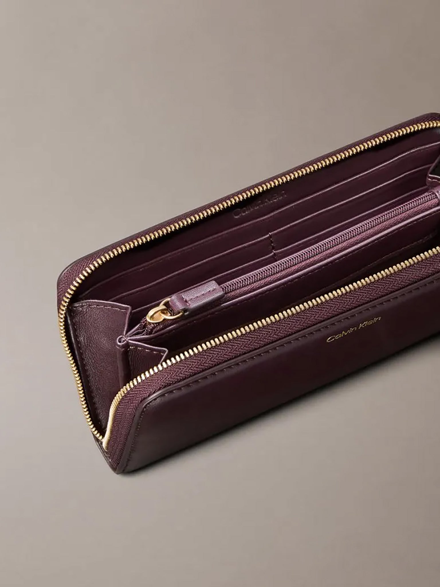 Γυναικείο πορτοφόλι CK PULLER LARGE ZIP AROUND LV04F1093GBAP | LV04F1093GBAP
